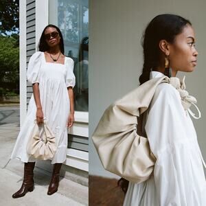 A Bronze Age XL Kimi Sand Cream Cotton Canvas Croissant Shoulder Bag